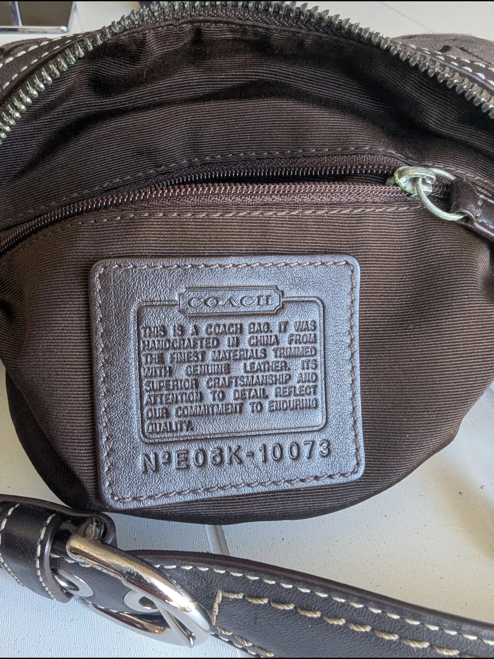 Vintage Coach SohoSignature Canvas HoboShoulder Bag in chocolate brown.